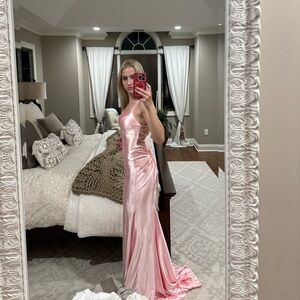 Selling 2 dresses never worn